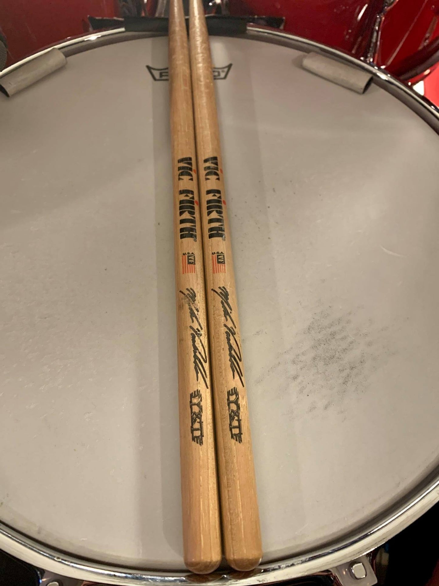 Mike Vanderhule Signature Drumsticks with the Y&T Logo