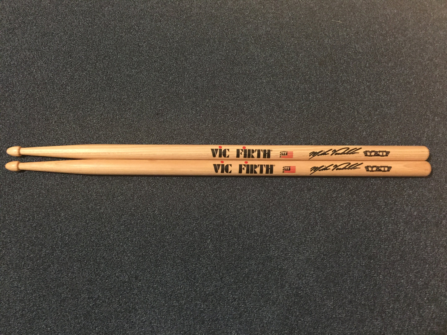 Mike Vanderhule Signature Drumsticks with the Y&T Logo